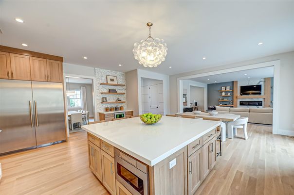 Chandelier, Dining room, Interior, Kitchen, Living room, Pendant Lights, Recessed Lighting, Stainless Steel Appliances, Wood Texture Flooring