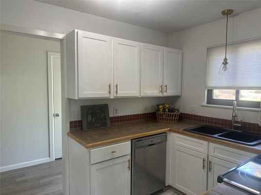 Interior, Kitchen, Pendant Lights, Tile Countertops, Wood Texture Flooring