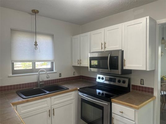 Interior, Kitchen, Pendant Lights, Tile Countertops