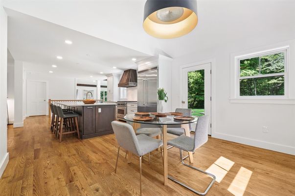 Dining room, Interior, Kitchen, Recessed Lighting, Stainless Steel Appliances, Wood Texture Flooring