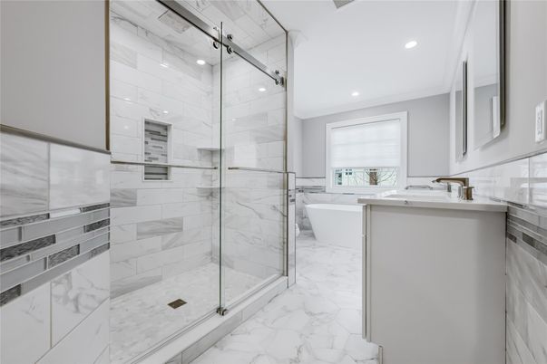 Bathroom, Free Standing Baths, Glass Shower, Interior, Marble, Marble Walls, Recessed Lighting