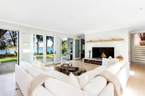 Fireplace, Interior, Living room, Recessed Lighting, Water, Wood Texture Flooring