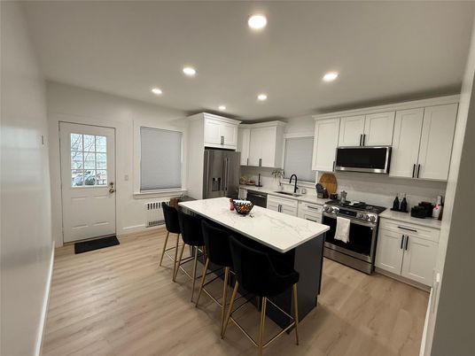 Interior, Kitchen, Recessed Lighting, Stainless Steel Appliances, Wood Texture Flooring