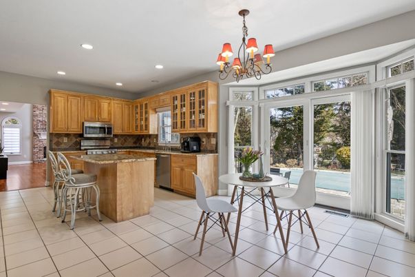 Chandelier, Dining room, Interior, Kitchen, Recessed Lighting, Stainless Steel Appliances, Wood Texture Flooring