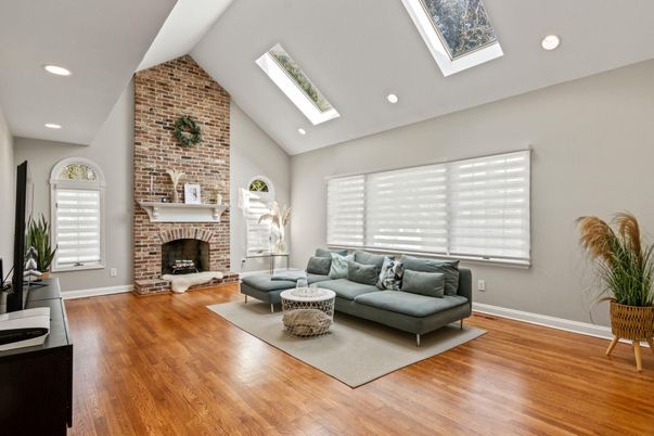 Fireplace, Interior, Living room, Recessed Lighting, Stone Walls, Wood Texture Flooring