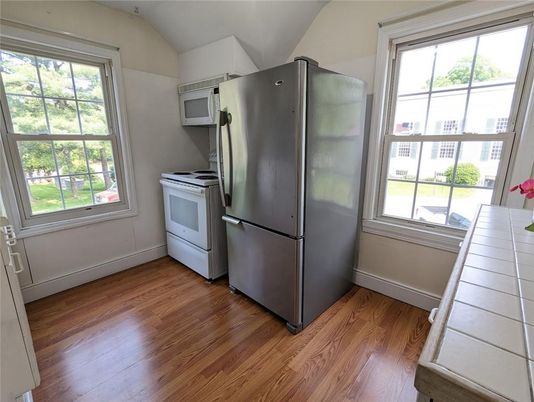 Interior, Kitchen, Tile Countertops, Wood Texture Flooring