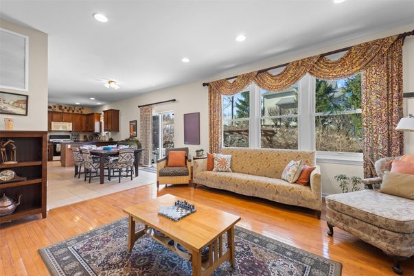 Dining room, Interior, Kitchen, Living room, Recessed Lighting, Stainless Steel Appliances, Wood Texture Flooring