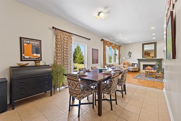 Dining room, Fireplace, Interior, Living room, Recessed Lighting, Wood Texture Flooring