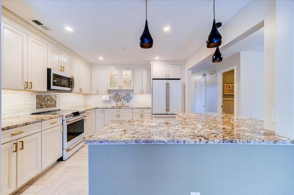 Interior, Kitchen, Pendant Lights, Recessed Lighting, Stainless Steel Appliances, Wood Texture Flooring