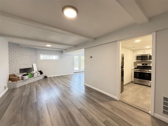 Interior, Kitchen, Recessed Lighting, Stainless Steel Appliances, Stone Walls, Wood Texture Flooring