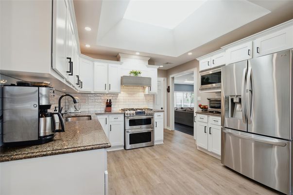Interior, Kitchen, Recessed Lighting, Stainless Steel Appliances, Wood Texture Flooring