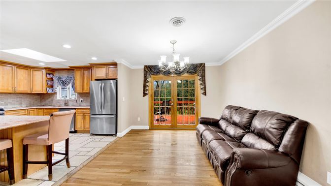 Chandelier, Interior, Kitchen, Living room, Recessed Lighting, Stainless Steel Appliances, Wood Texture Flooring