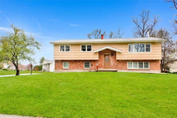 Exterior, Facade, Brick Facade, Raised Ranch