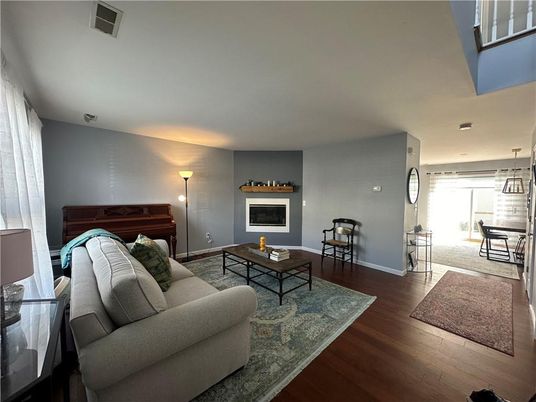 Dining room, Fireplace, Interior, Living room, Pendant Lights, Piano, Wood Texture Flooring