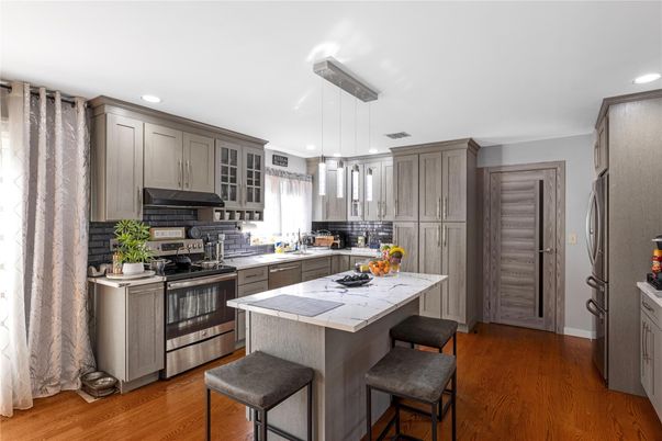 Interior, Kitchen, Pendant Lights, Recessed Lighting, Stainless Steel Appliances, Wood Texture Flooring
