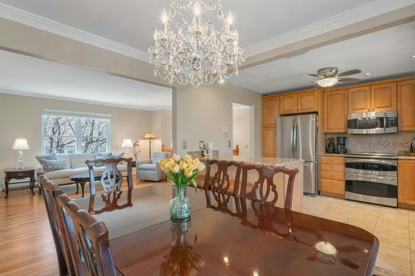Chandelier, Dining room, Interior, Kitchen, Living room, Stainless Steel Appliances, Wood Texture Flooring