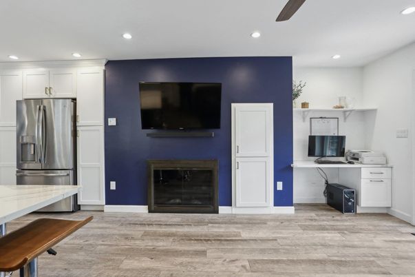 Fireplace, Interior, Kitchen, Recessed Lighting, Stainless Steel Appliances, Wood Texture Flooring