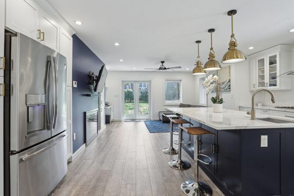 Fireplace, Interior, Kitchen, Pendant Lights, Recessed Lighting, Stainless Steel Appliances, Wood Texture Flooring