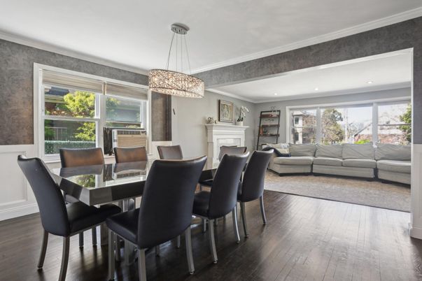 Chandelier, Dining room, Fireplace, Interior, Living room, Pendant Lights, Recessed Lighting, Wood Texture Flooring