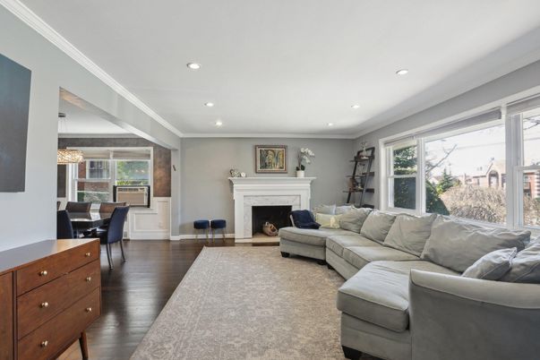 Dining room, Fireplace, Interior, Living room, Recessed Lighting, Wood Texture Flooring