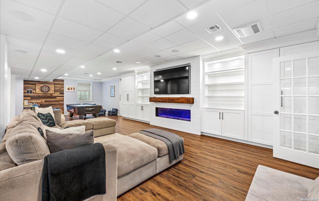 Billiard Table, Game Room, Interior, Living room, Recessed Lighting, Wood Texture Flooring, Wooden Walls