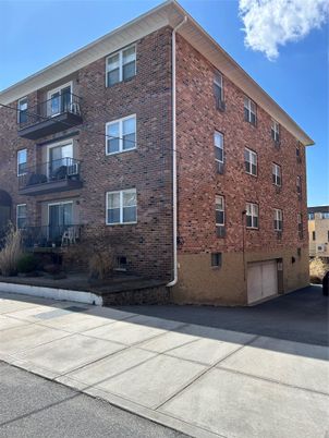 Exterior, Facade, Brick Facade, Condo Building