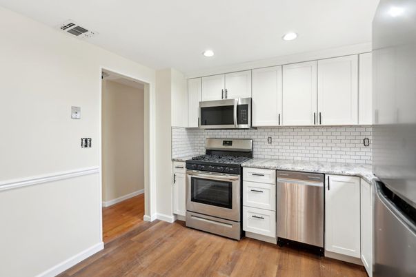 Interior, Kitchen, Recessed Lighting, Stainless Steel Appliances, Wood Texture Flooring