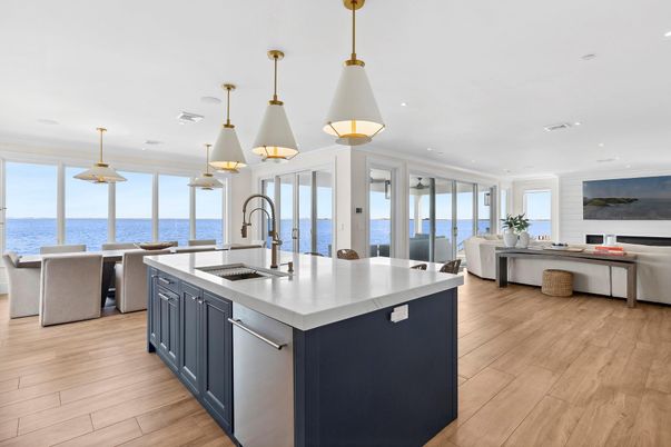 Dining room, Interior, Kitchen, Pendant Lights, Recessed Lighting, Stainless Steel Appliances, Water, Wood Texture Flooring