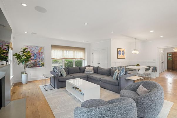 Dining room, Fireplace, Interior, Living room, Pendant Lights, Recessed Lighting, Wood Texture Flooring