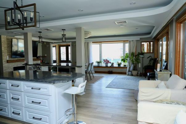 Dining room, Fireplace, Interior, Kitchen, Pendant Lights, Recessed Lighting, Stone Walls, Wood Texture Flooring