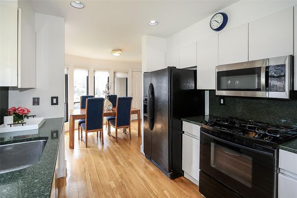Dining room, Interior, Kitchen, Recessed Lighting, Stainless Steel Appliances, Wood Texture Flooring