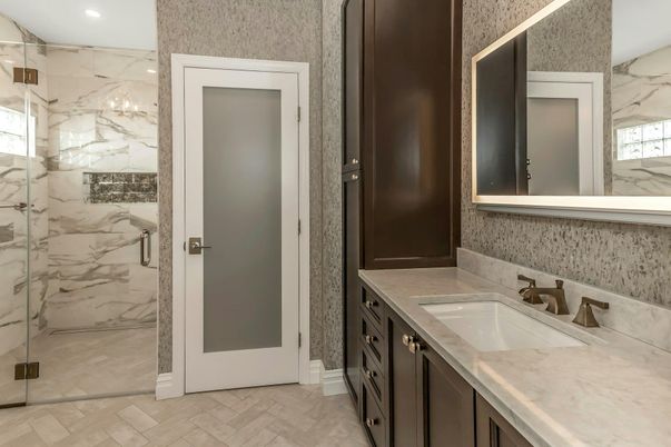 Bathroom, Dual Sink Vanities, Glass Shower, Interior, Marble Walls, Recessed Lighting