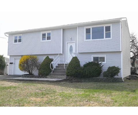 Attached, Exterior, Facade, Raised Ranch