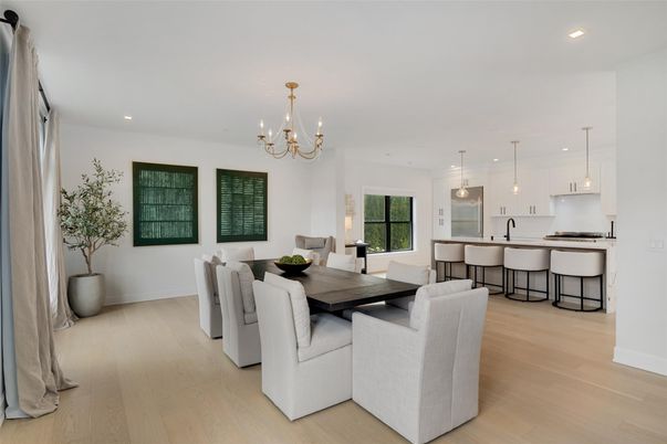 Chandelier, Dining room, Interior, Kitchen, Pendant Lights, Recessed Lighting, Stainless Steel Appliances, Wood Texture Flooring