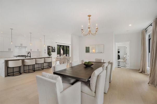 Chandelier, Dining room, Interior, Kitchen, Pendant Lights, Recessed Lighting, Stainless Steel Appliances, Wood Texture Flooring