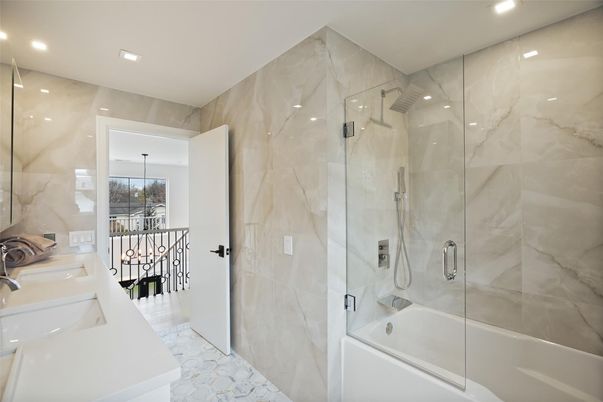 Bathroom, Dual Sink Vanities, Glass Shower, Interior, Marble Walls, Recessed Lighting