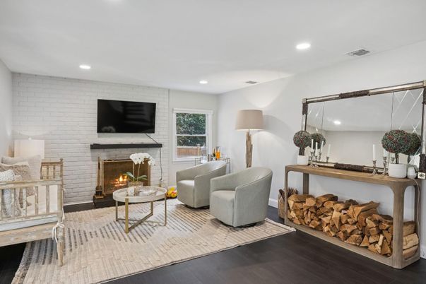 Fireplace, Interior, Living room, Recessed Lighting, Stone Walls, Wood Texture Flooring