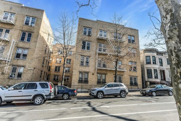 Exterior, Facade, Brick Facade, Condo Building