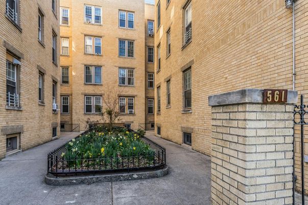 Exterior, Facade, Brick Facade, Condo Building