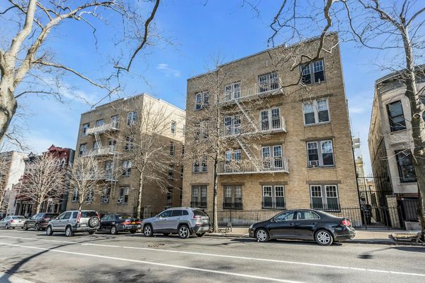 Exterior, Facade, Brick Facade, Condo Building