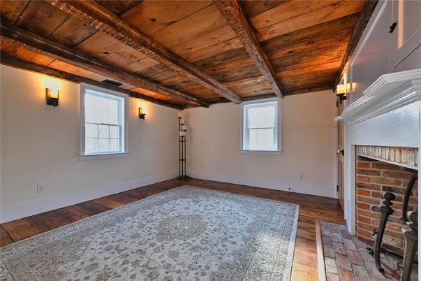 Empty room, Fireplace, Interior, Stone Walls, Wooden Beams, Wooden Ceilings, Wood Texture Flooring