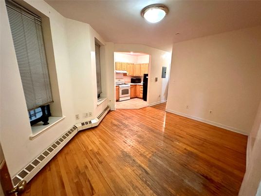 Empty room, Interior, Kitchen, Stainless Steel Appliances, Wood Texture Flooring
