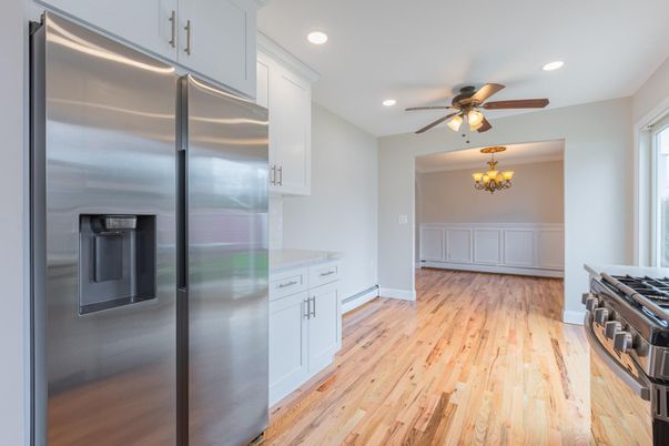 Chandelier, Interior, Kitchen, Recessed Lighting, Stainless Steel Appliances, Wood Texture Flooring