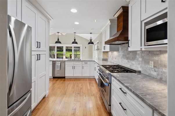 Interior, Kitchen, Pendant Lights, Recessed Lighting, Stainless Steel Appliances, Wood Texture Flooring