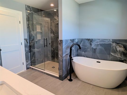Bathroom, Free Standing Baths, Glass Shower, Interior, Recessed Lighting, Wood Texture Flooring