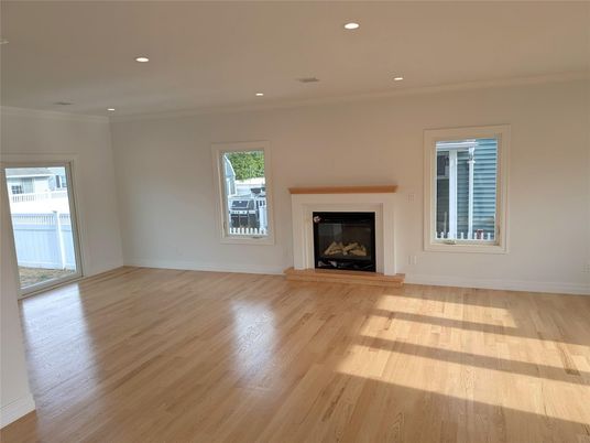 Empty room, Fireplace, Interior, Recessed Lighting, Wood Texture Flooring