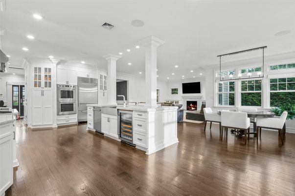 Dining room, Fireplace, Interior, Kitchen, Living room, Pendant Lights, Recessed Lighting, Stainless Steel Appliances, Wood Texture Flooring