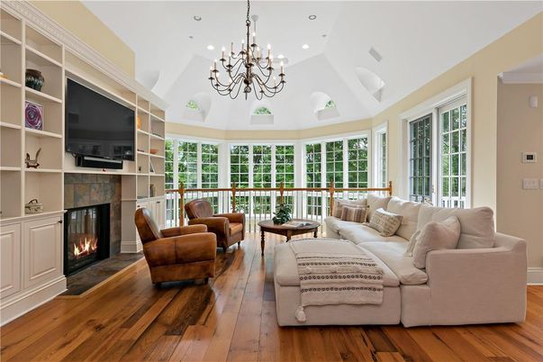 Chandelier, Fireplace, Interior, Living room, Recessed Lighting, Wood Texture Flooring