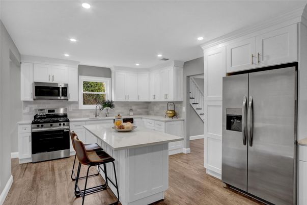 Interior, Kitchen, Recessed Lighting, Stainless Steel Appliances, Wood Texture Flooring