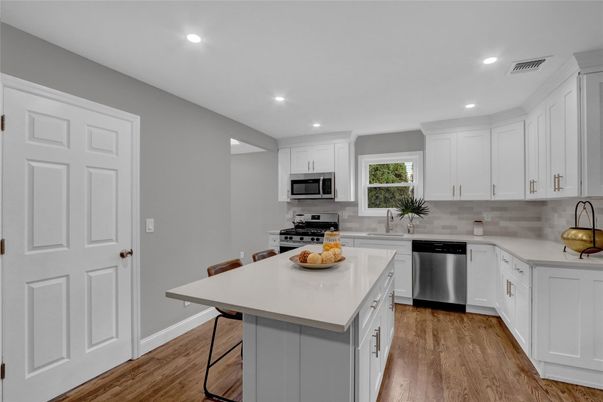 Interior, Kitchen, Recessed Lighting, Stainless Steel Appliances, Wood Texture Flooring